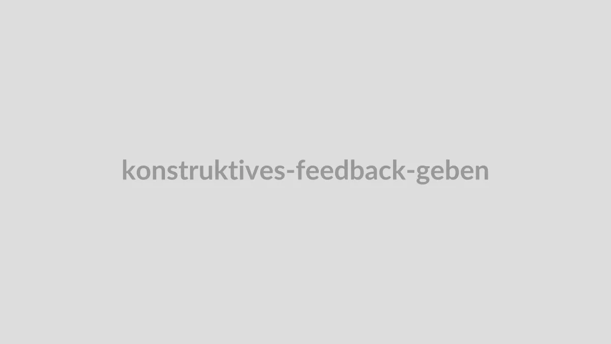 Zwei Personen im Gespräch, die Feedback geben und empfangen, symbolisiert Wachstum